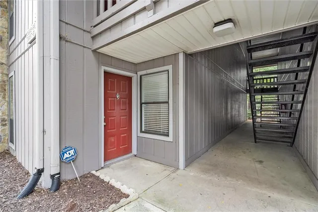 a spacious bathroom with a sink and a mirror