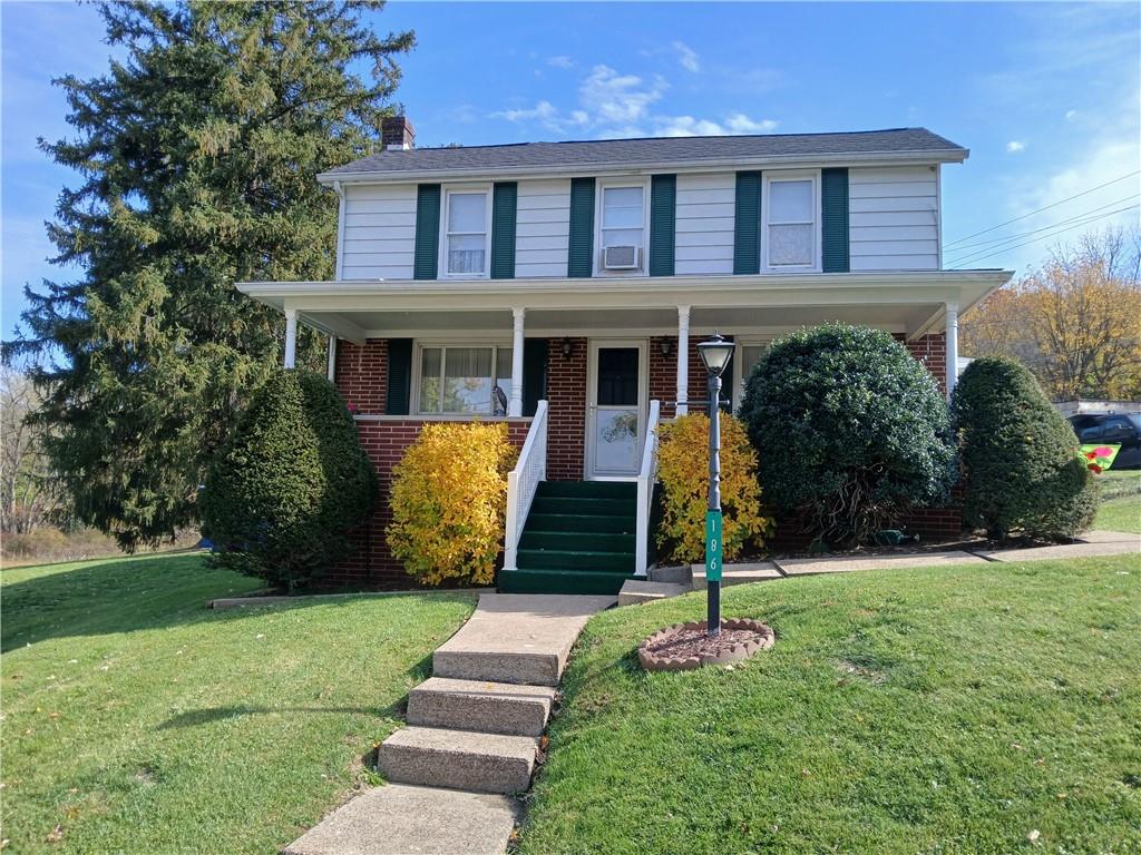 186 Dutch Hill Road Latrobe, PA 15650 - Photo 1 of 29 a front view of a house with a yard