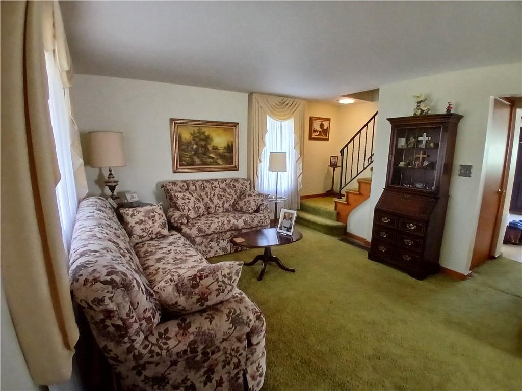 186 Dutch Hill Road Latrobe, PA 15650 - Photo 12 of 29 a living room with furniture and a flat screen tv