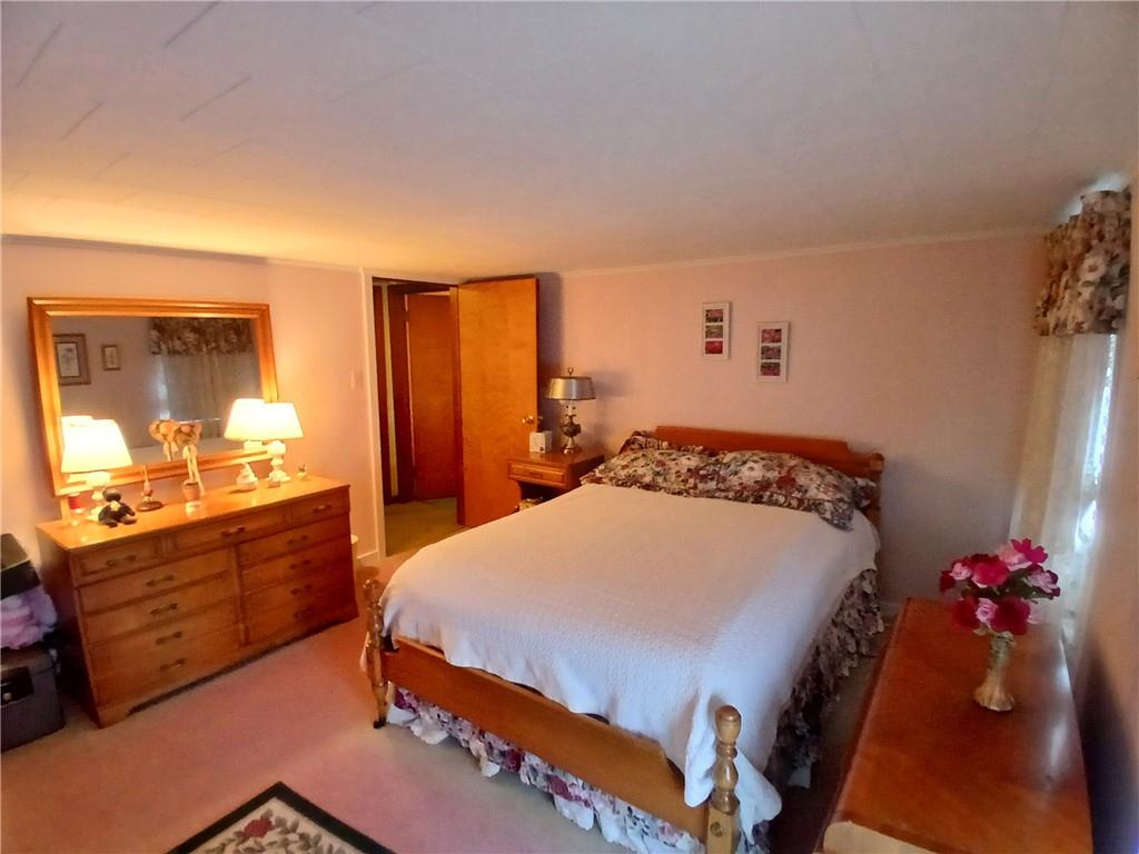 186 Dutch Hill Road Latrobe, PA 15650 - Photo 18 of 29 a bedroom with a bed and dresser