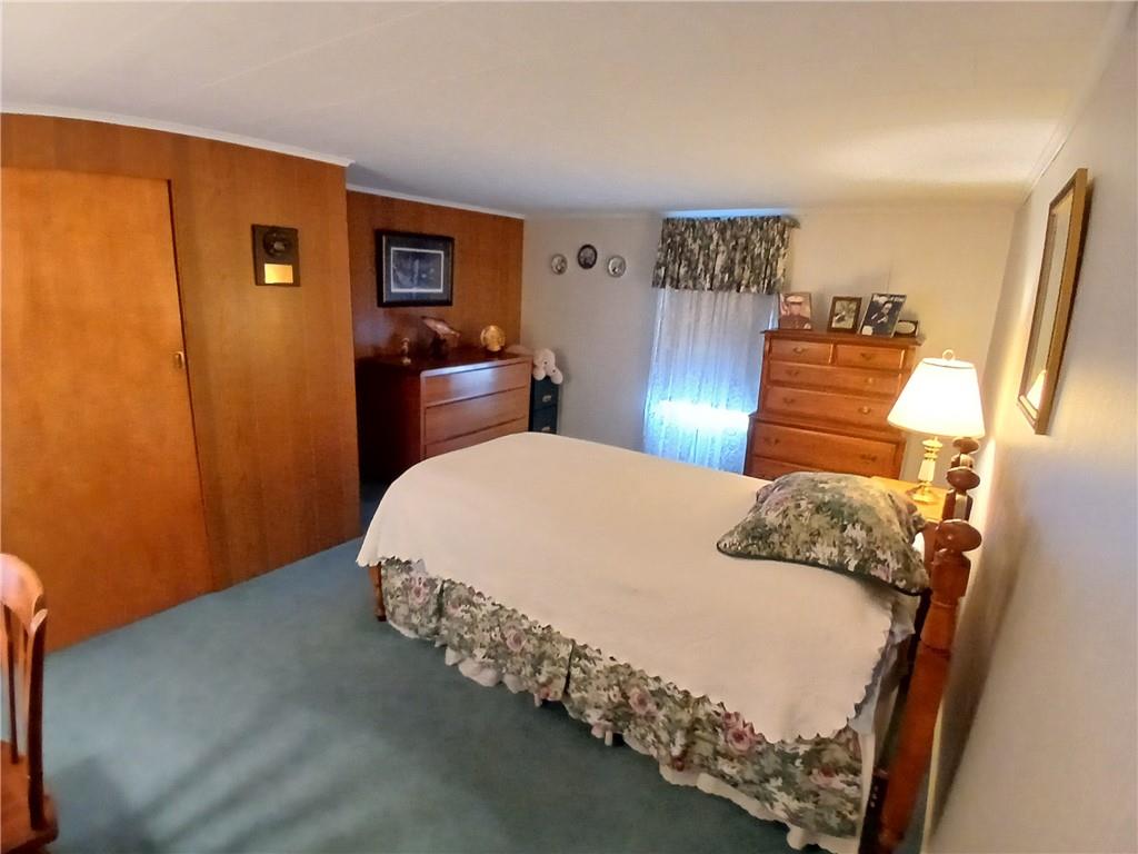 186 Dutch Hill Road Latrobe, PA 15650 - Photo 19 of 29 a bed sitting in a bedroom next to a window