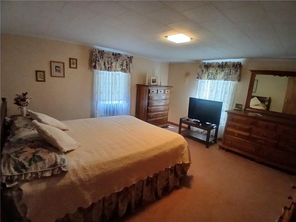 186 Dutch Hill Road Latrobe, PA 15650 - Photo 21 of 29 a bedroom with a bed and furniture