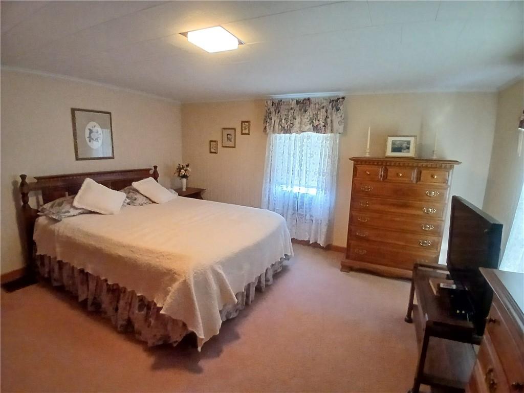 186 Dutch Hill Road Latrobe, PA 15650 - Photo 22 of 29 a bed sitting in a bedroom next to a window