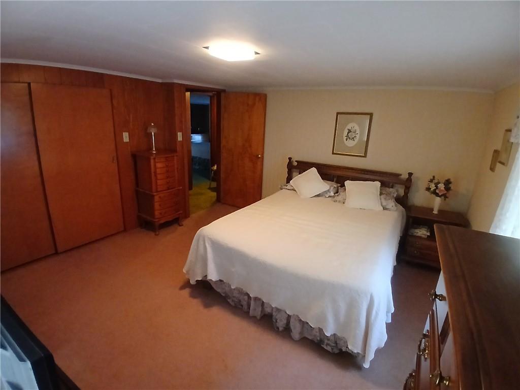 186 Dutch Hill Road Latrobe, PA 15650 - Photo 23 of 29 a bed room with a bed and a table