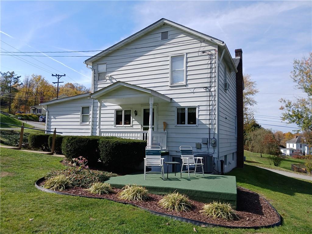186 Dutch Hill Road Latrobe, PA 15650 - Photo 24 of 29 a front view of a house with a garden