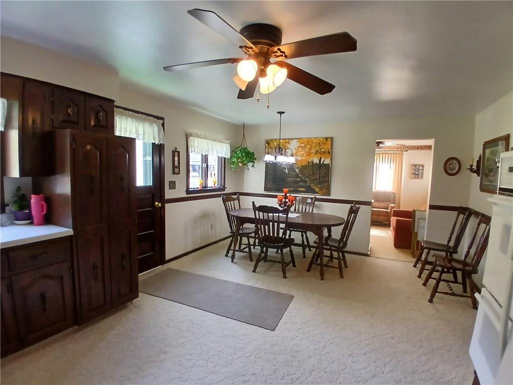 186 Dutch Hill Road Latrobe, PA 15650 - Photo 9 of 29 a view of a dining room with furniture and chandelier