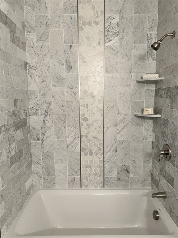 197 Condor Street, Unit 4 Boston, MA 02128 - Photo 11 of 14 a bathroom with a bathtub and a shower