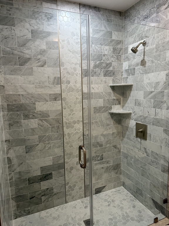 197 Condor Street, Unit 4 Boston, MA 02128 - Photo 9 of 14 a bathroom with a shower