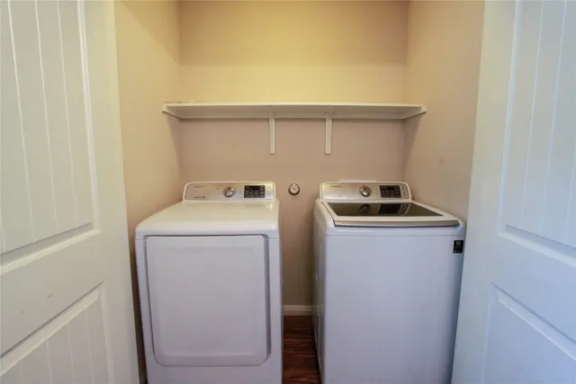 a utility room with dryer and washer