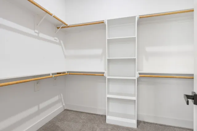 a view of an empty walk in closet