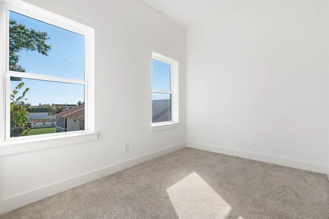 an empty room with windows