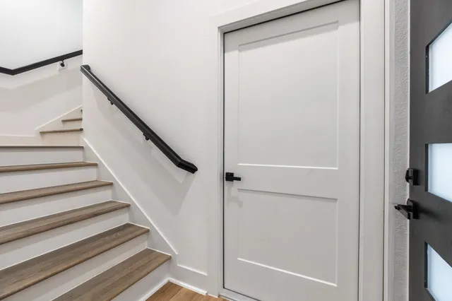 a view of entryway with wooden floor