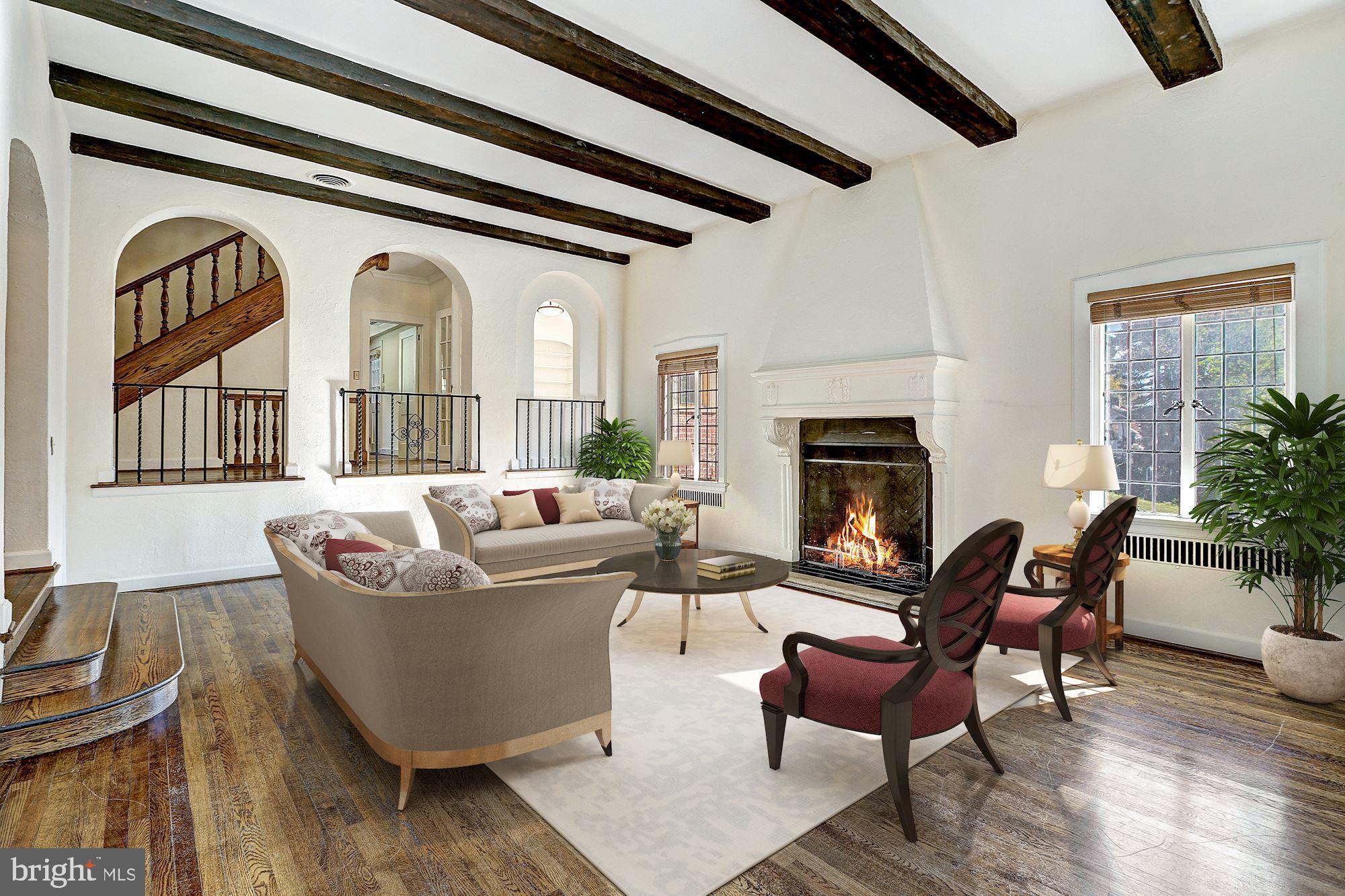 2701 32nd Street Northwest Washington, DC 20008 - Photo 4 of 17 a living room with furniture and a fireplace