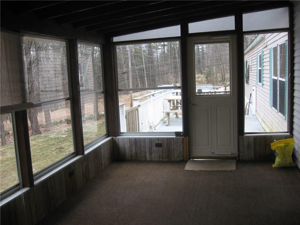 15 Dawes Hill Road Harrison, ME 04040 - Photo 20 of 23 Enclosed sunroom leads out to a nice...