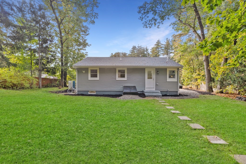 256 Great Road Maynard, MA 01754 - Photo 26 of 26 a view of a house with backyard and garden