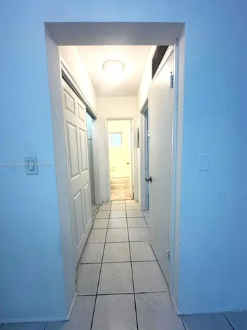 a bathroom with a toilet a sink and bathtub