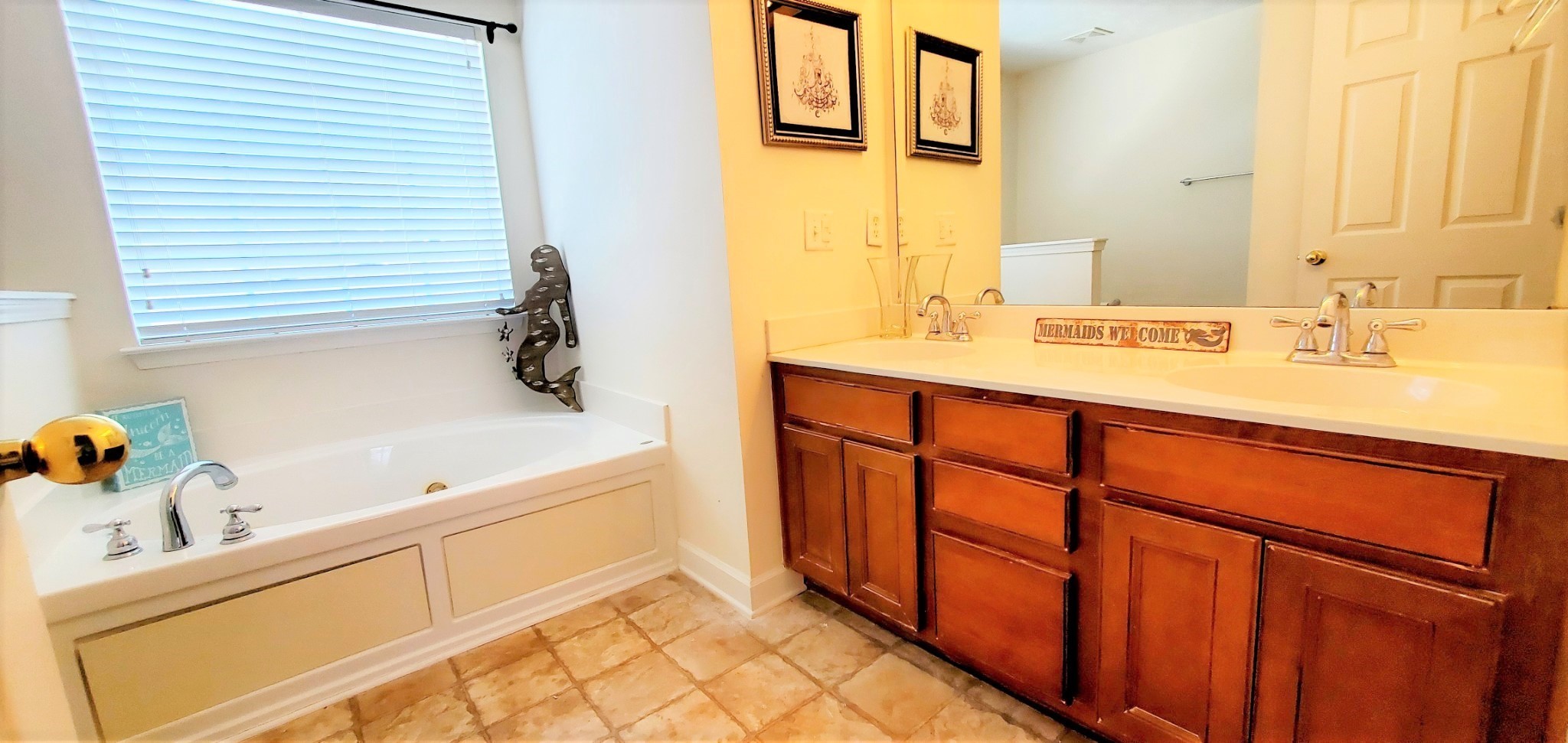 8008 Streamside Drive Mount Juliet, TN 37122 - Photo 13 of 35 a bathroom with a sink and a mirror