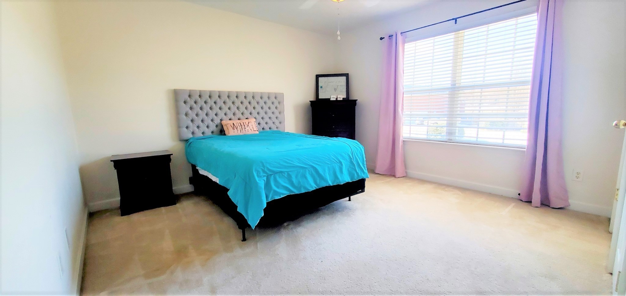 8008 Streamside Drive Mount Juliet, TN 37122 - Photo 15 of 35 a bedroom with a bed and a window