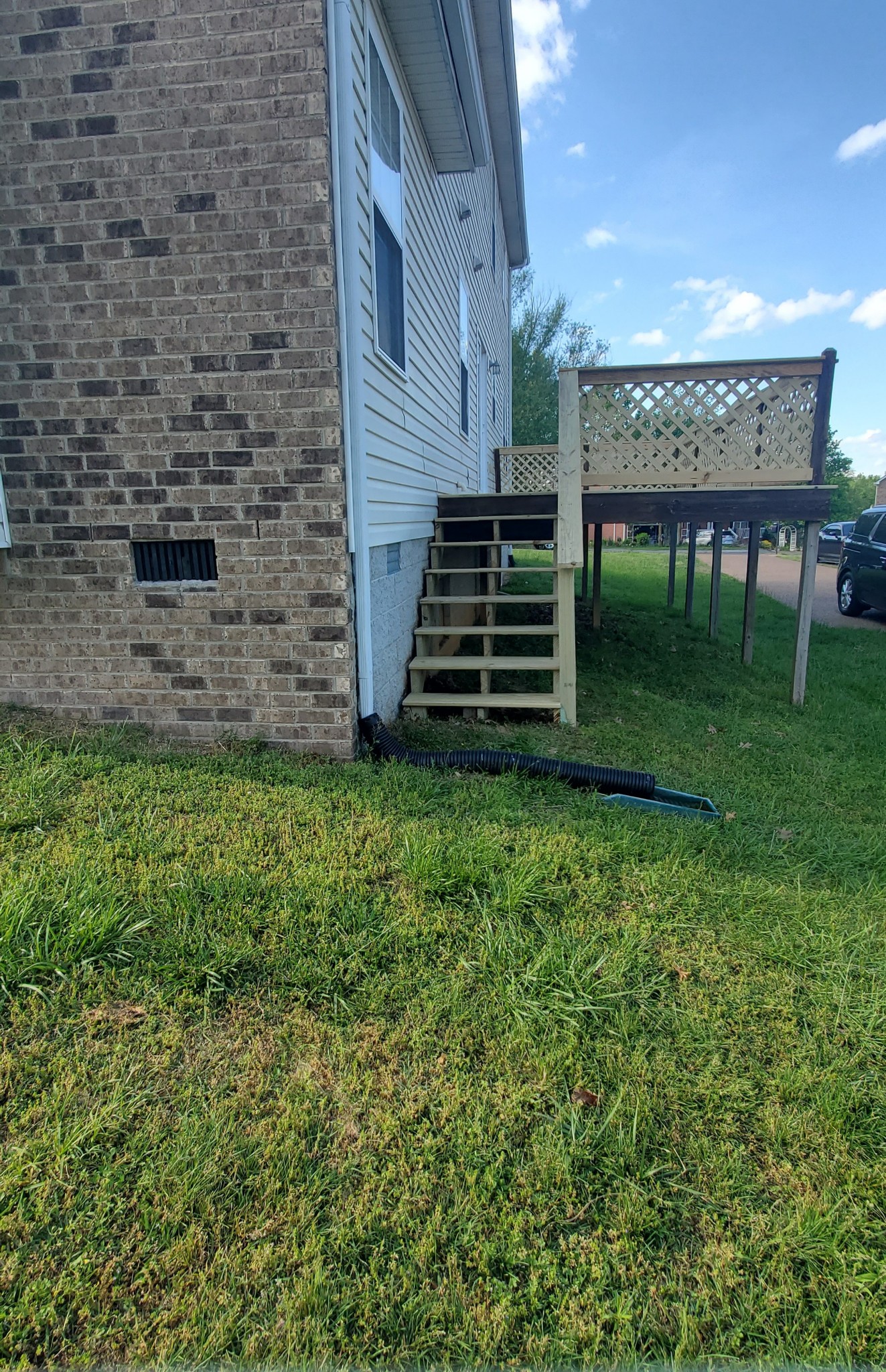 8008 Streamside Drive Mount Juliet, TN 37122 - Photo 20 of 35 a view of a backyard with plants and large tree