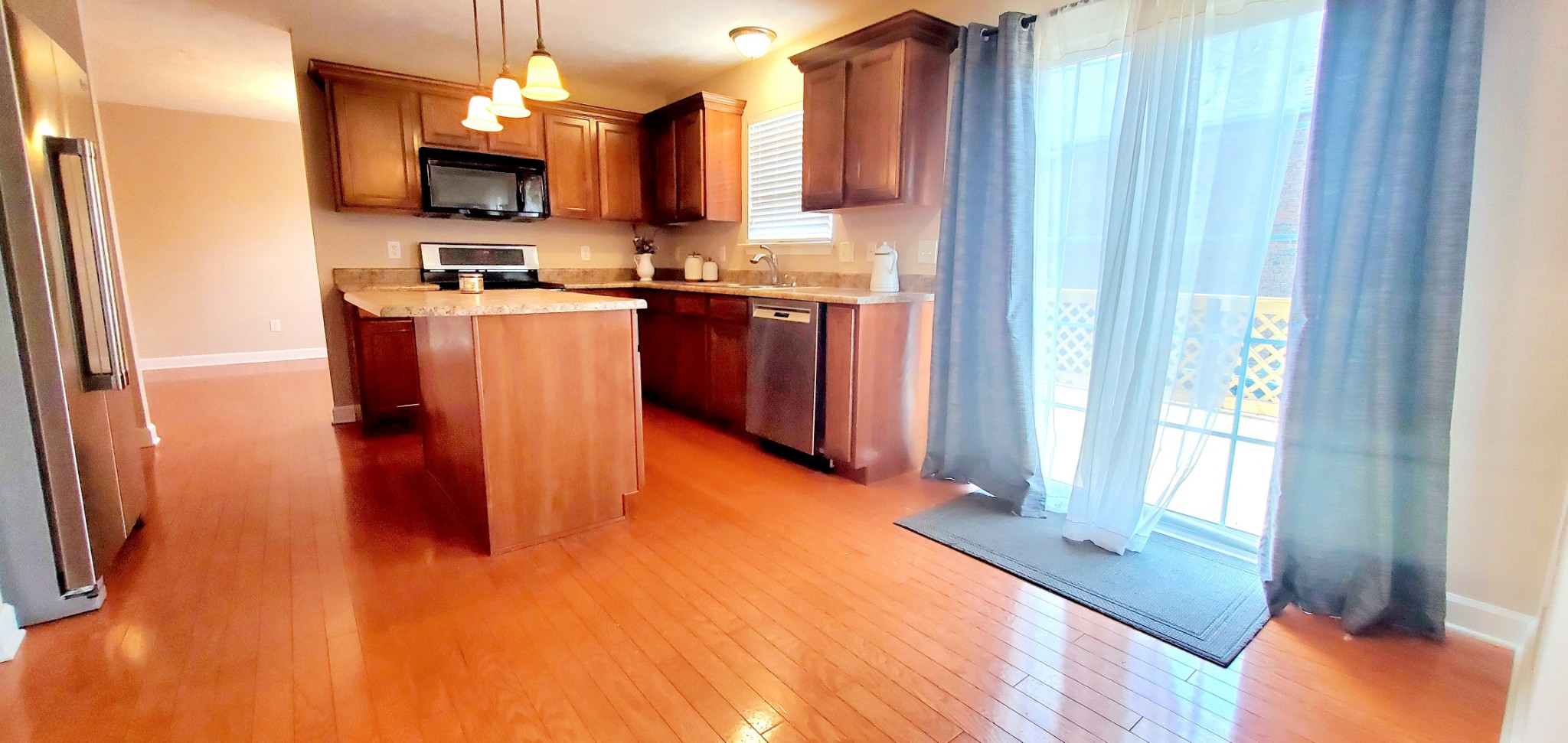 8008 Streamside Drive Mount Juliet, TN 37122 - Photo 23 of 35 a kitchen with stainless steel appliances granite countertop a refrigerator a stove top oven a sink and dishwasher
