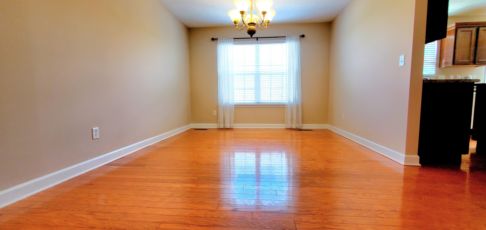 8008 Streamside Drive Mount Juliet, TN 37122 - Photo 25 of 35 a view of empty room with wooden floor and fan