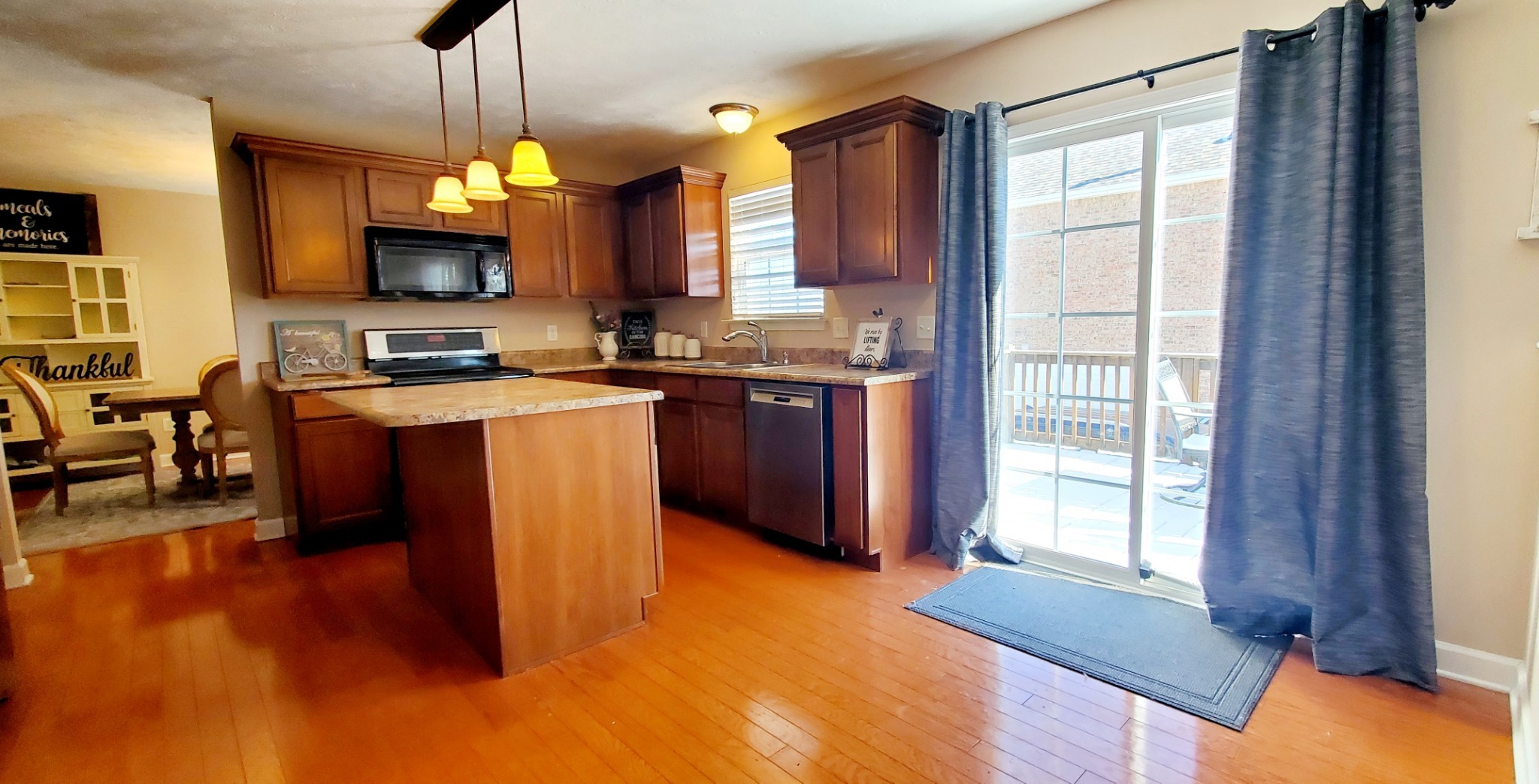 8008 Streamside Drive Mount Juliet, TN 37122 - Photo 4 of 35 a kitchen with cabinets and a stove