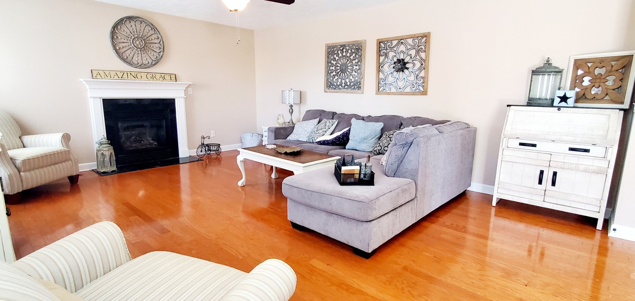 8008 Streamside Drive Mount Juliet, TN 37122 - Photo 10 of 35 a living room with furniture and a wall with kitchen