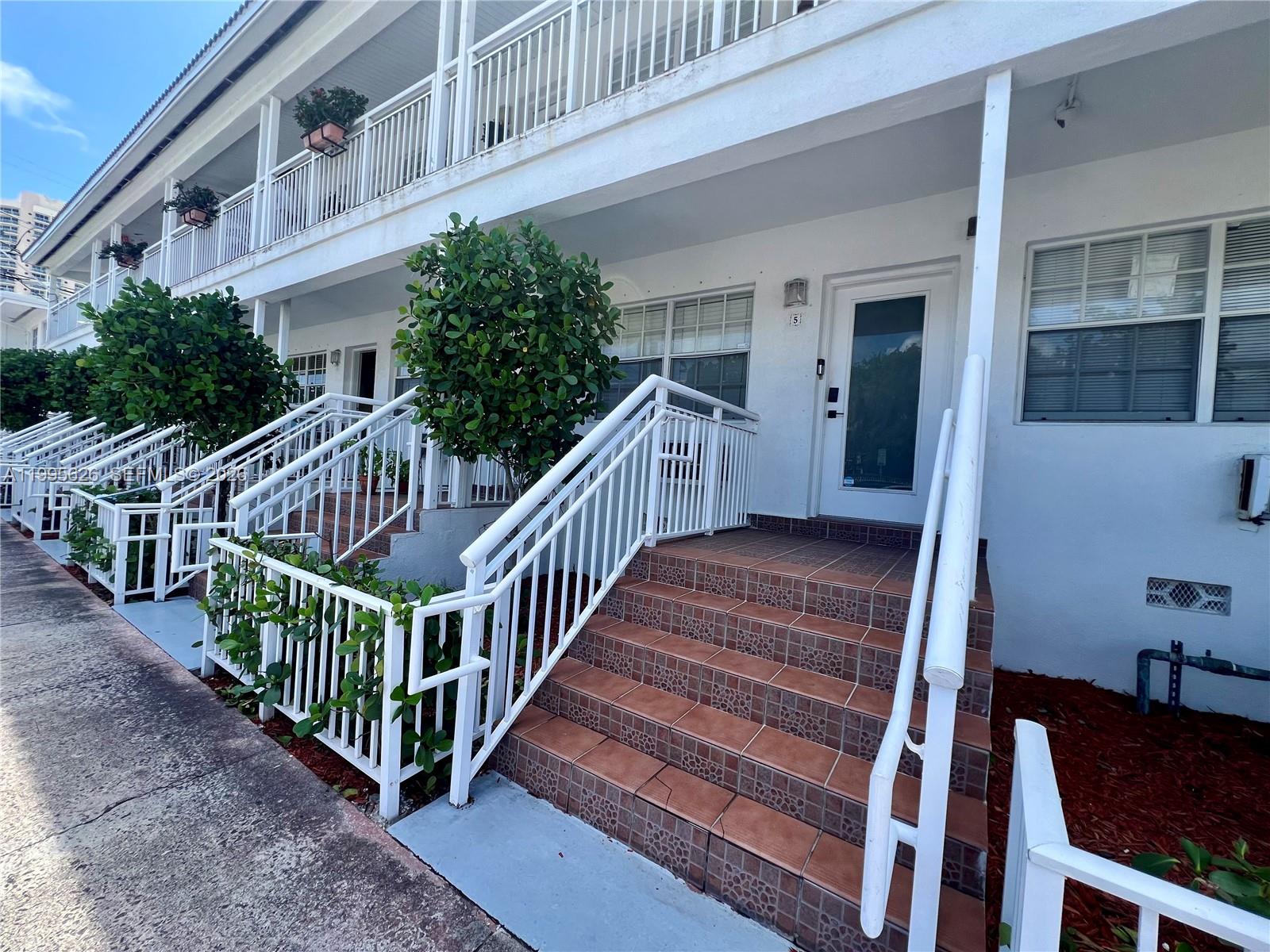 330 74th Street, Unit 5 Miami Beach, FL 33141 - Photo 1 of 19 a view of a house with deck and deck