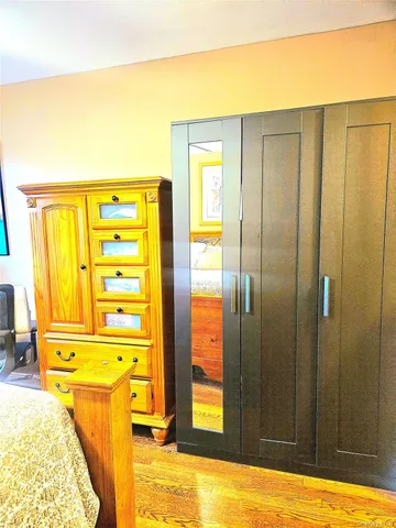 a view of a bathroom with a tub and shower