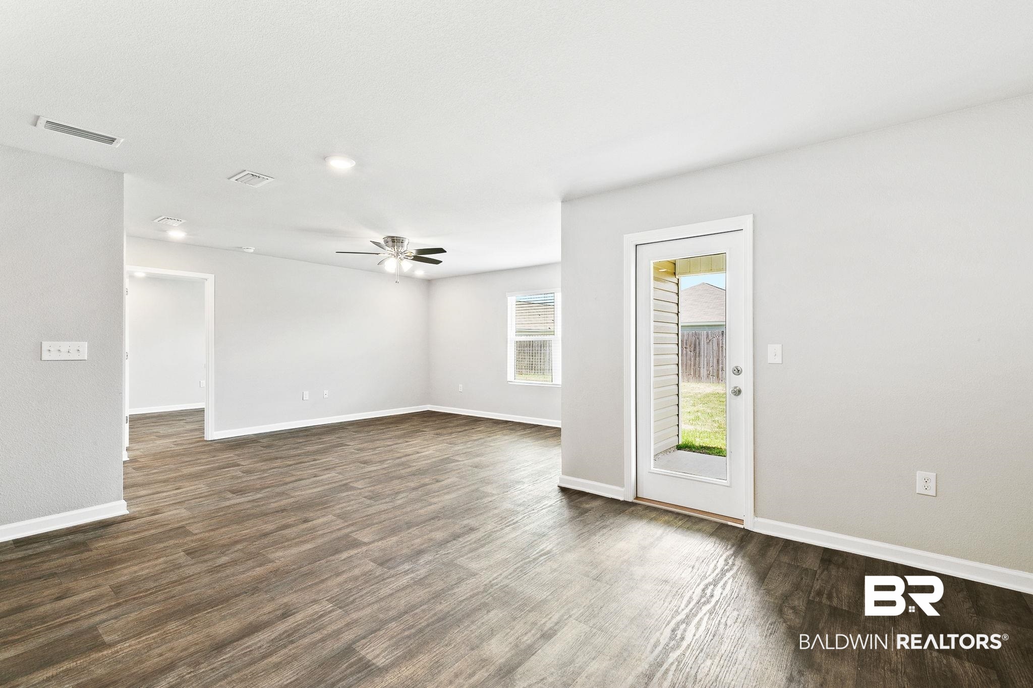 17129 Lanier Boulevard Foley, AL 36535 - Photo 12 of 37 Open to Den and Back Patio