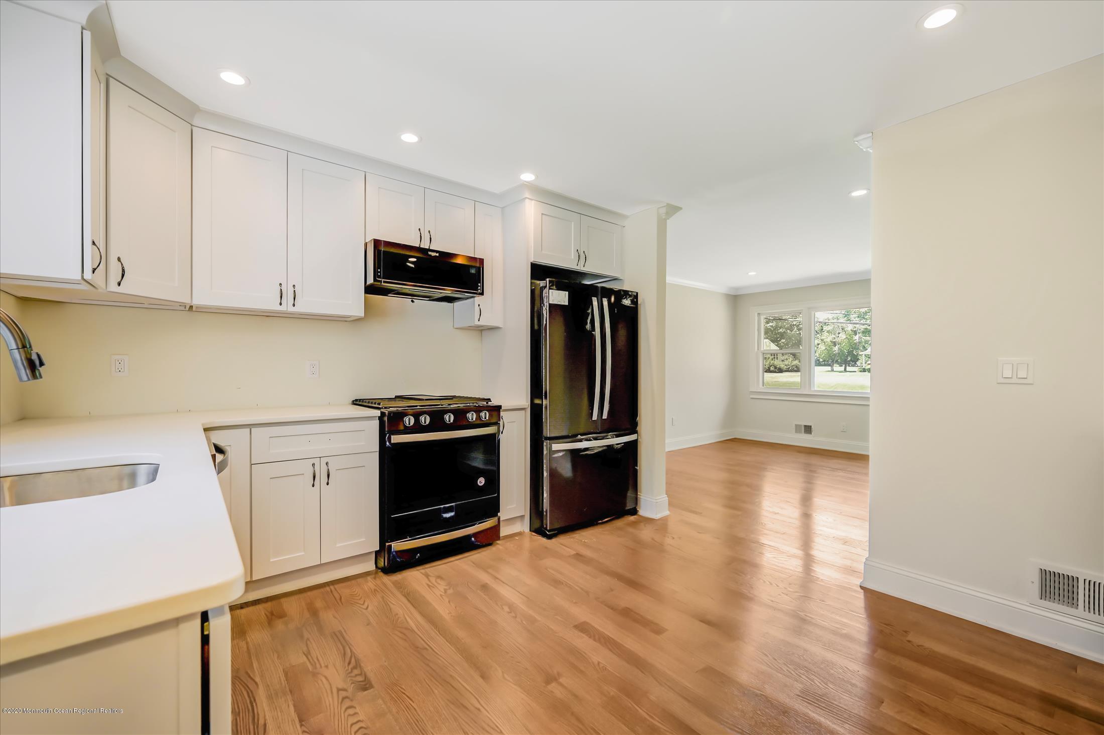44 Bucks Mill Road Colts Neck, NJ 07722 - Photo 5 of 27 Kitchen to Living