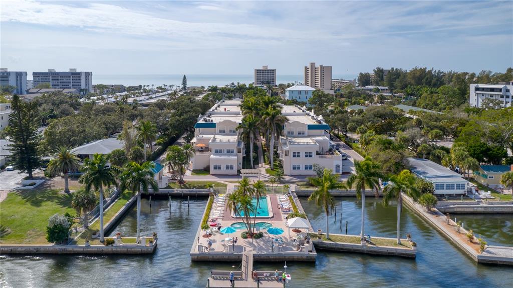 5963 Midnight Pass Road, Unit 332 Sarasota, FL 34242 - Photo 2 of 49 a view of a city with tall buildings