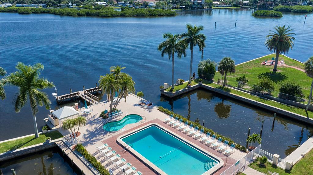 5963 Midnight Pass Road, Unit 332 Sarasota, FL 34242 - Photo 30 of 49 an aerial view of house with yard