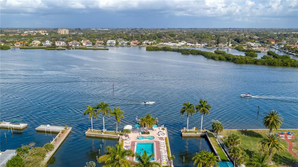 5963 Midnight Pass Road, Unit 332 Sarasota, FL 34242 - Photo 32 of 49 an aerial view of a house with a lake view
