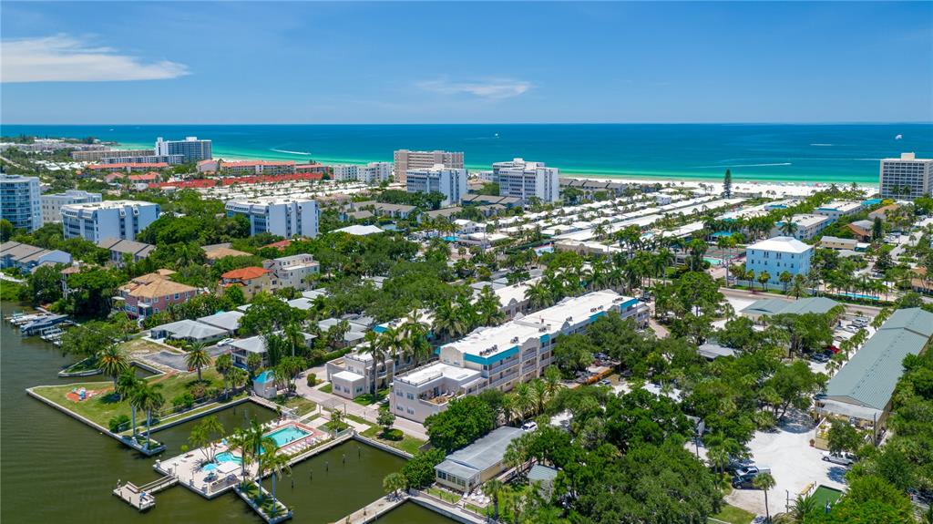 5963 Midnight Pass Road, Unit 332 Sarasota, FL 34242 - Photo 38 of 49 a view of a city with ocean view