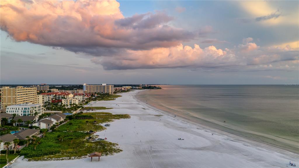 5963 Midnight Pass Road, Unit 332 Sarasota, FL 34242 - Photo 47 of 49 a view of a yard with an outdoor space