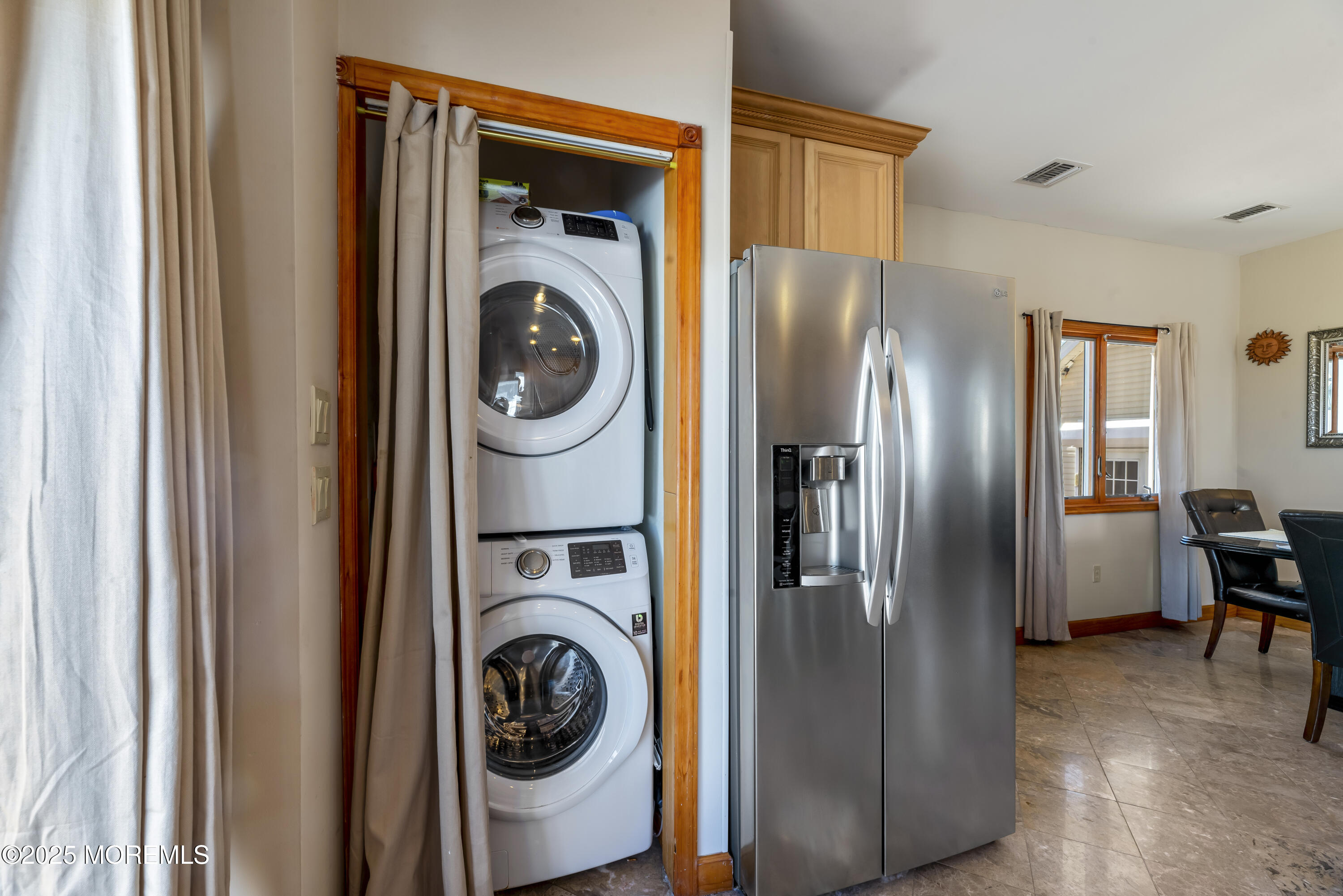 329 Front Street Union Beach, NJ 07735 - Photo 12 of 51 a view of a storage and utility room with washer and dryer