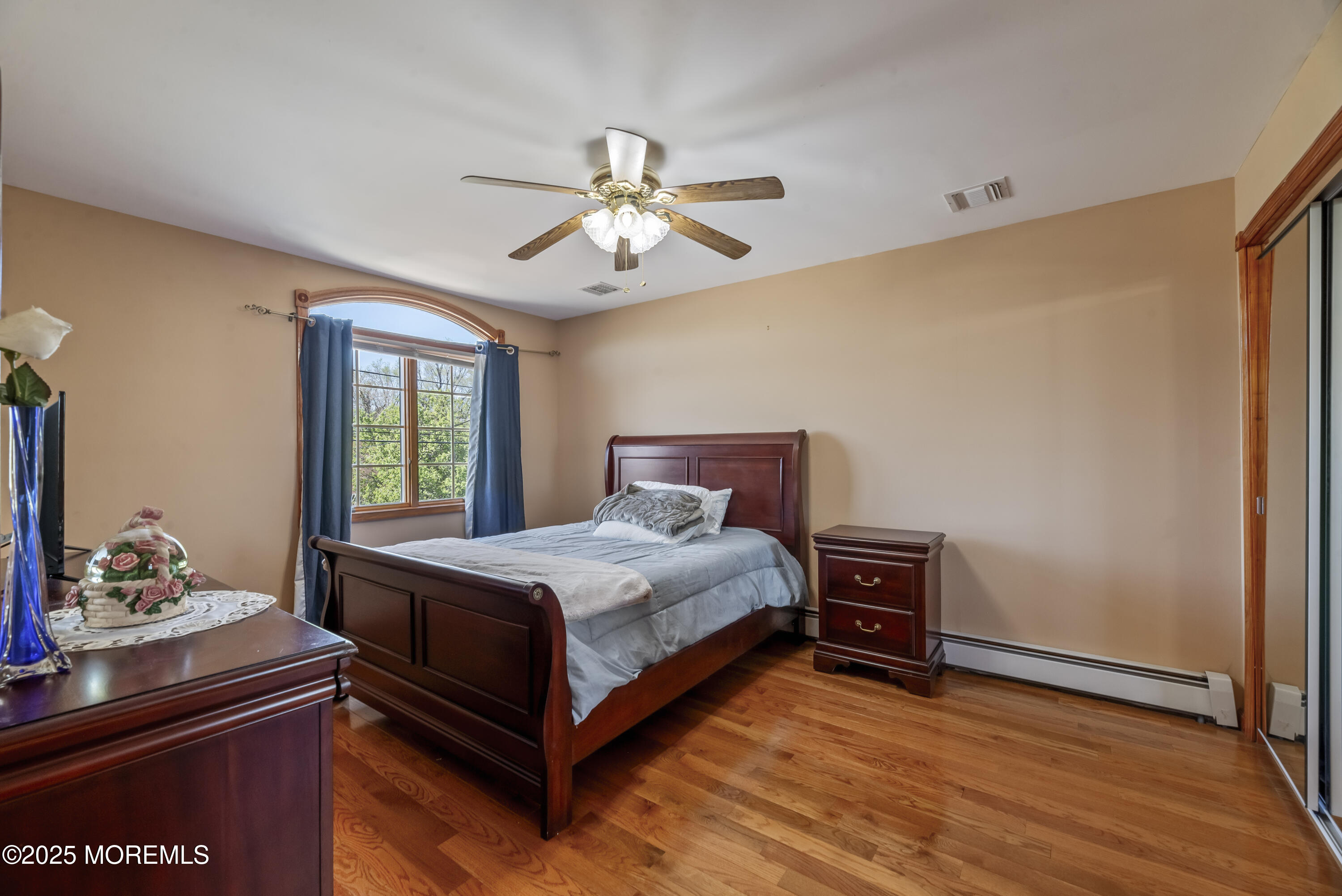 329 Front Street Union Beach, NJ 07735 - Photo 20 of 51 a bedroom with a bed and window