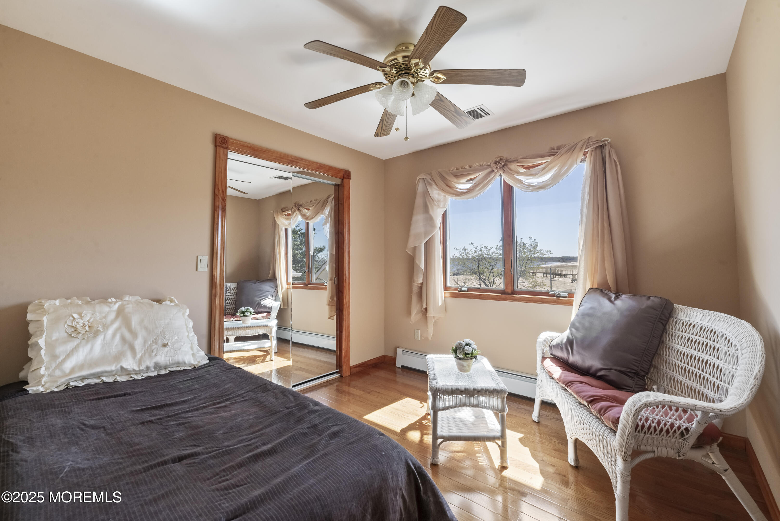 329 Front Street Union Beach, NJ 07735 - Photo 24 of 51 a bedroom with a bed and a large window