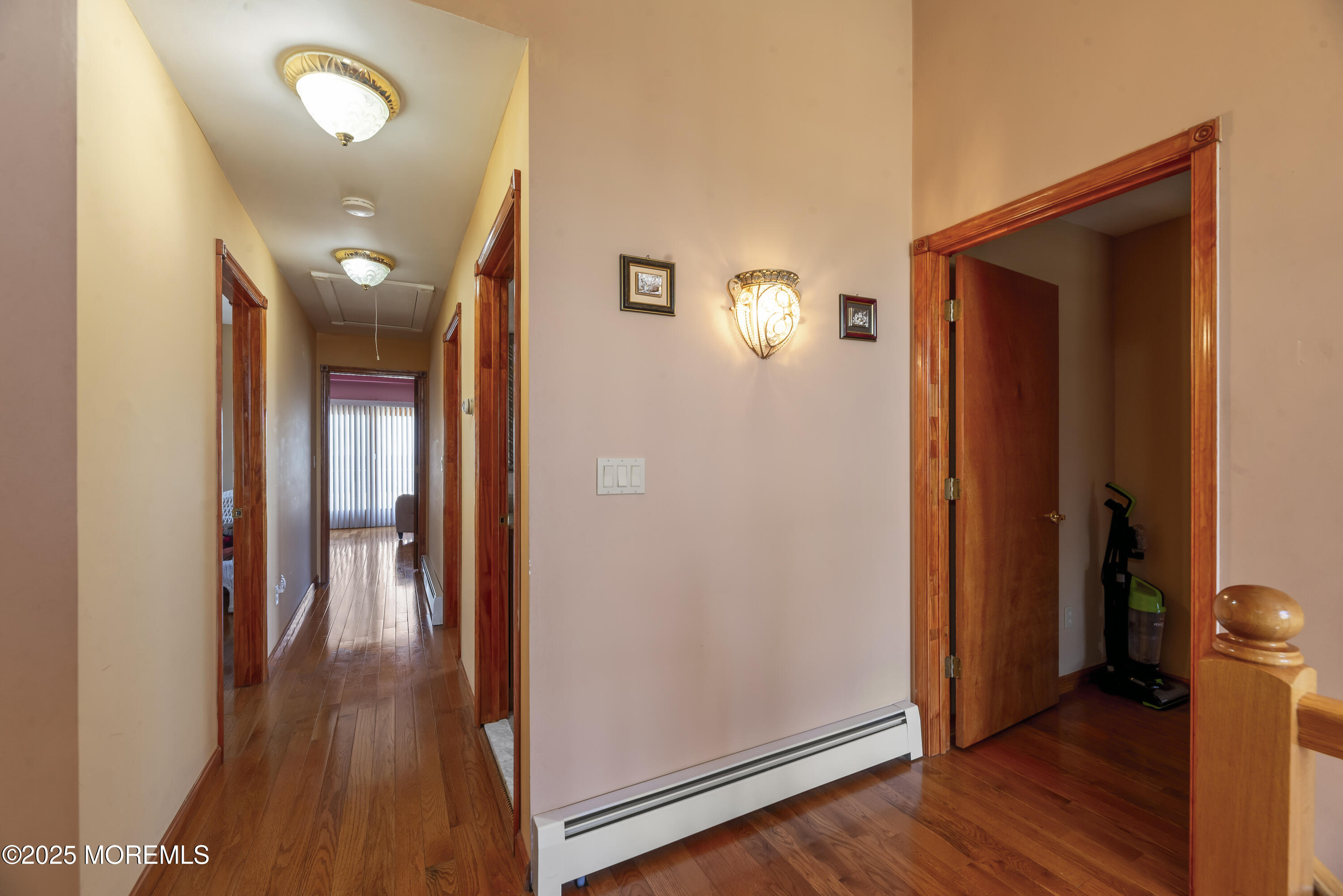 329 Front Street Union Beach, NJ 07735 - Photo 28 of 51 a view of a hallway with wooden floor