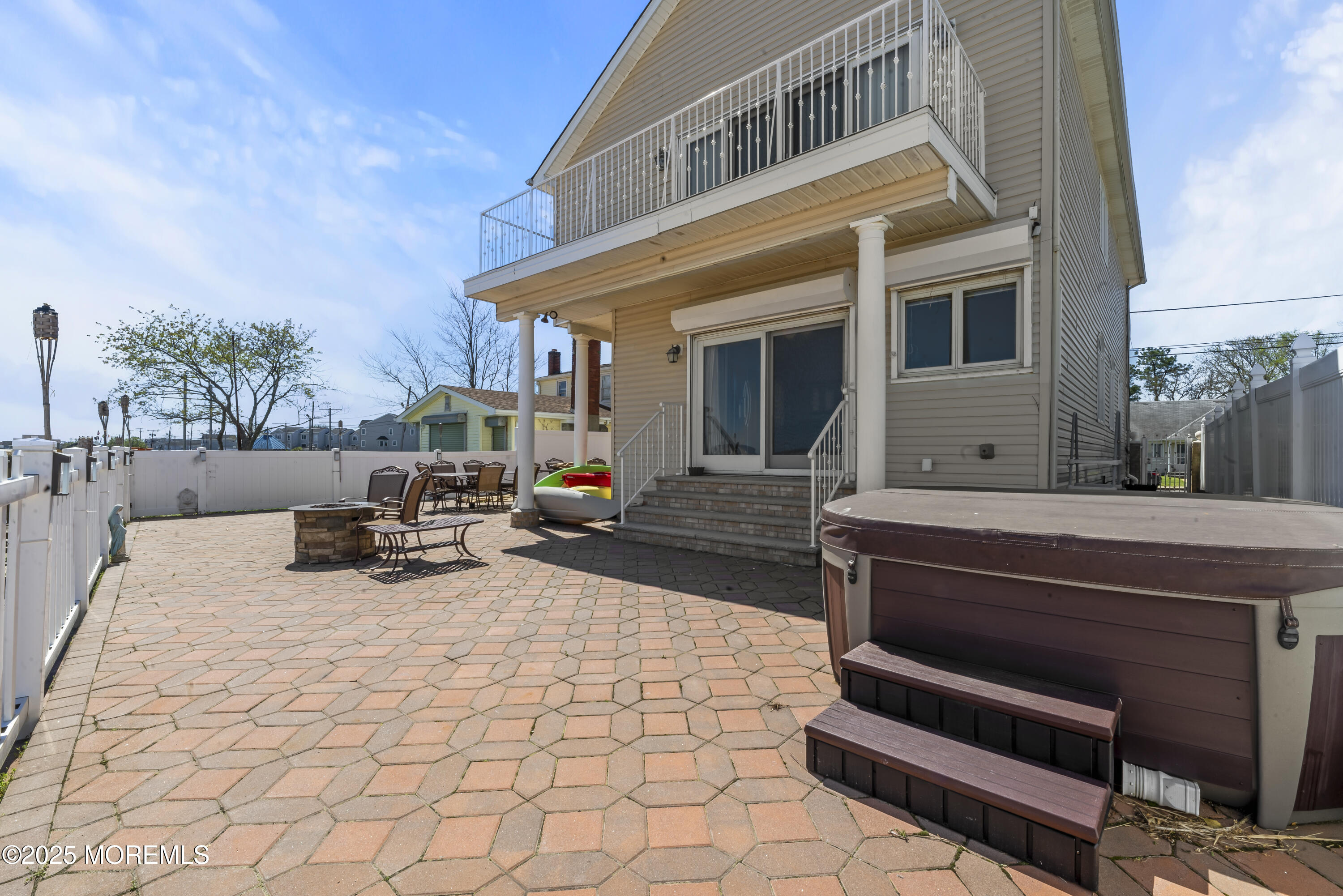 329 Front Street Union Beach, NJ 07735 - Photo 31 of 51 a view of a patio with table and chairs with wooden floor and fence