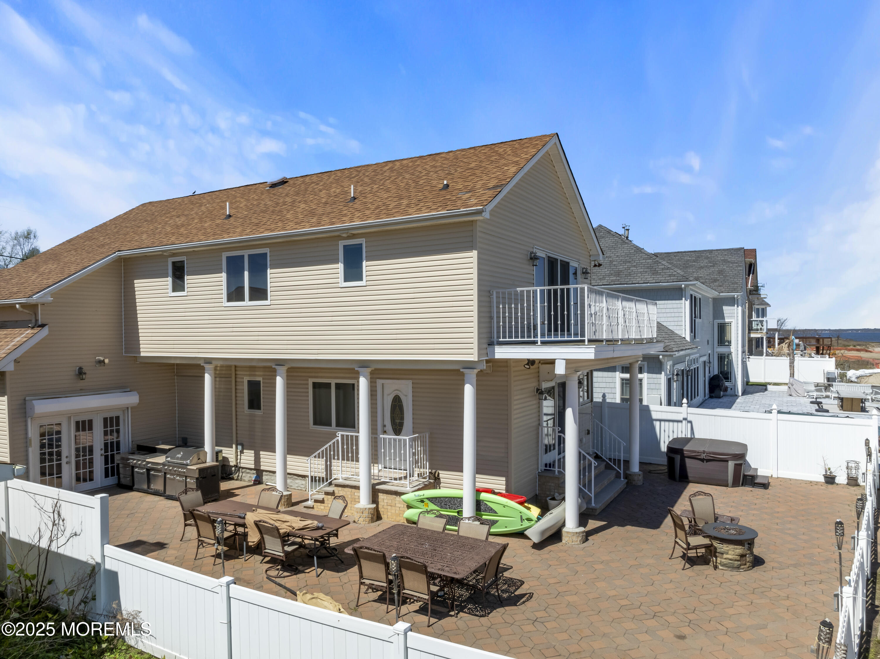 329 Front Street Union Beach, NJ 07735 - Photo 37 of 51 a backyard of a house with yard fire pit and outdoor seating