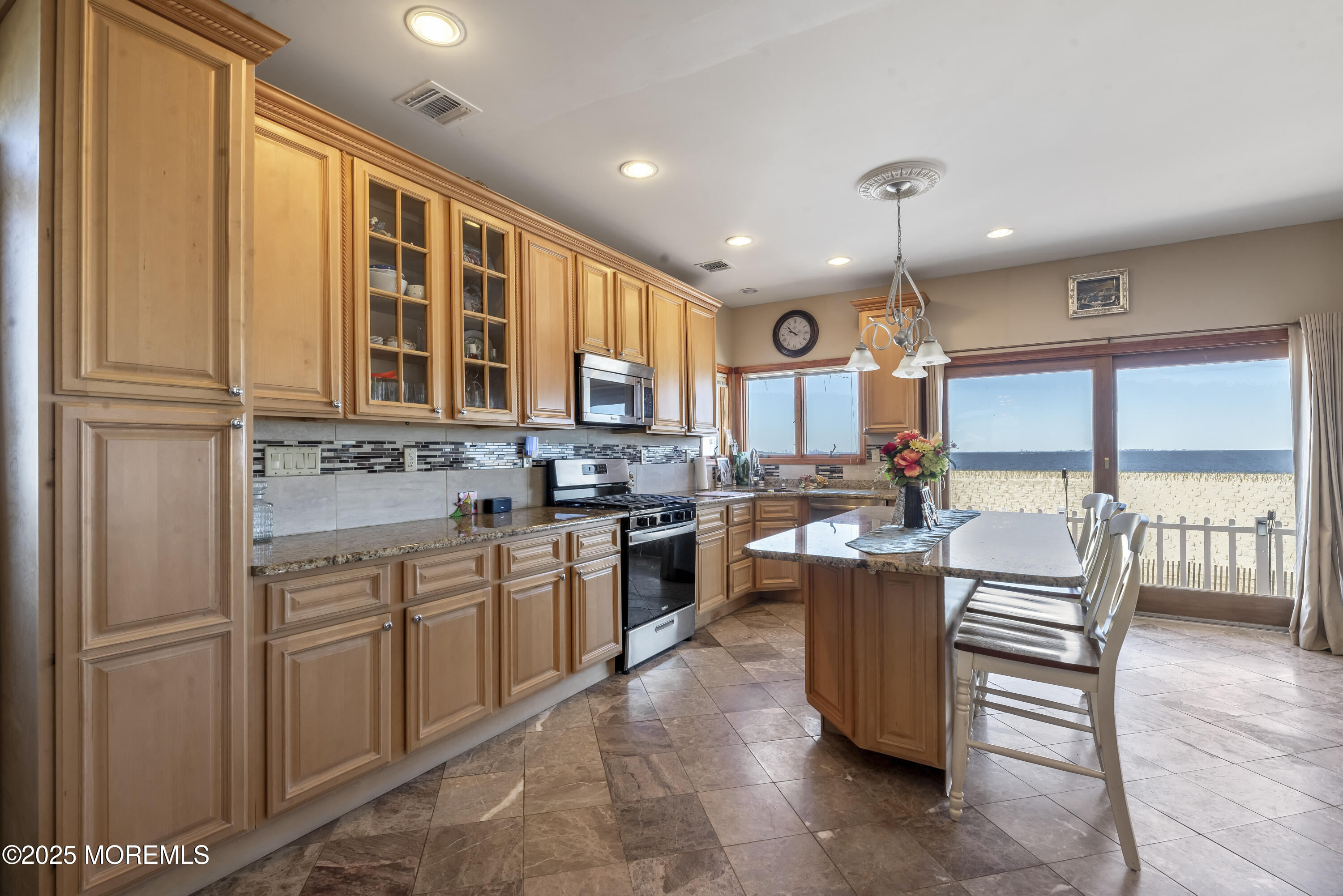 329 Front Street Union Beach, NJ 07735 - Photo 8 of 51 a kitchen with lots of counter top space and appliances