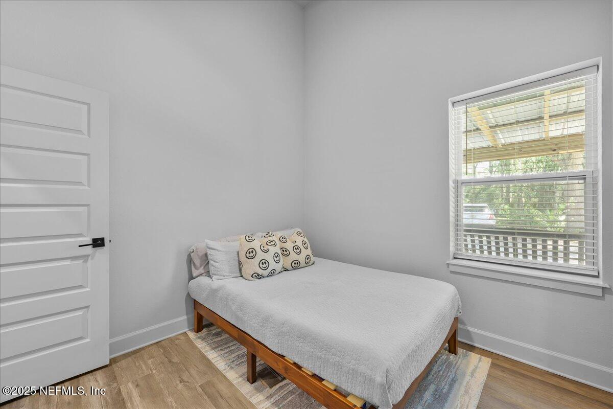 3514 Weaver Road Palatka, FL 32177 - Photo 14 of 30 a bedroom with a bed and a window