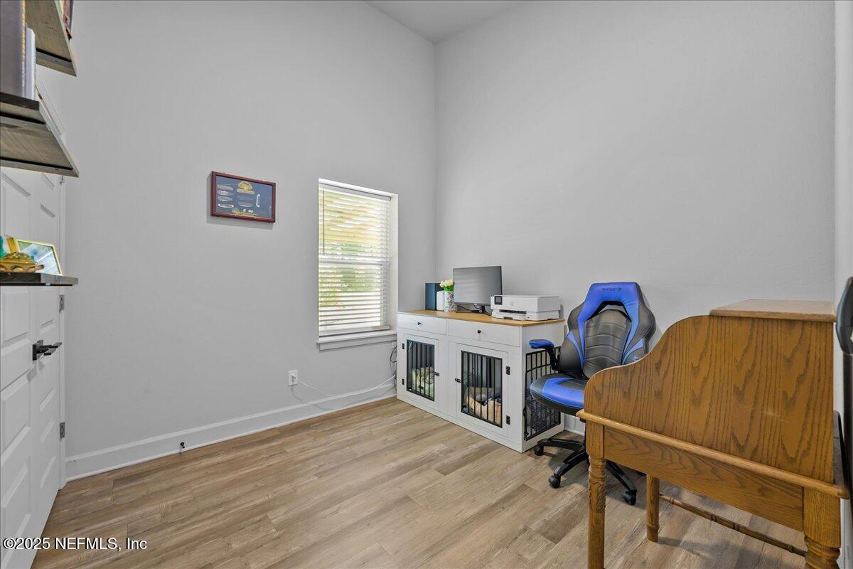 3514 Weaver Road Palatka, FL 32177 - Photo 15 of 30 a view of a workspace with furniture and a window