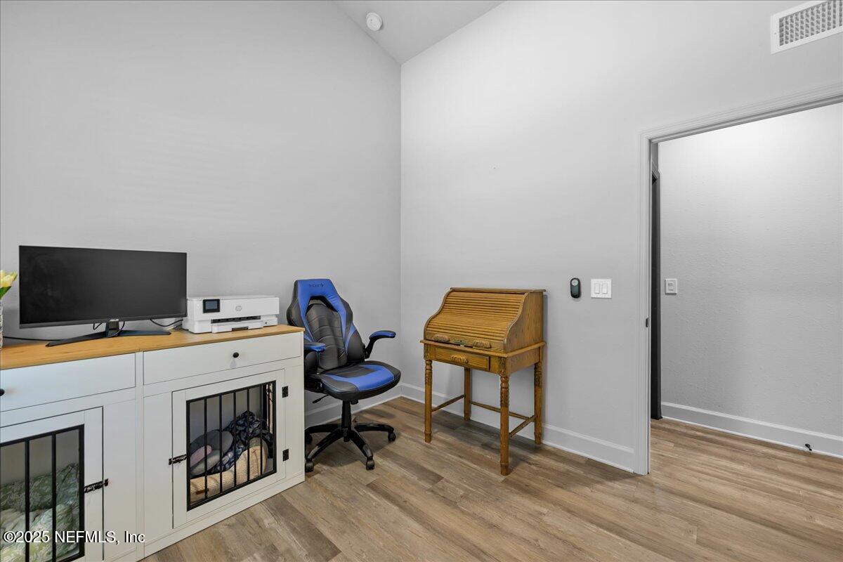 3514 Weaver Road Palatka, FL 32177 - Photo 16 of 30 a view of a workspace with furniture and a window