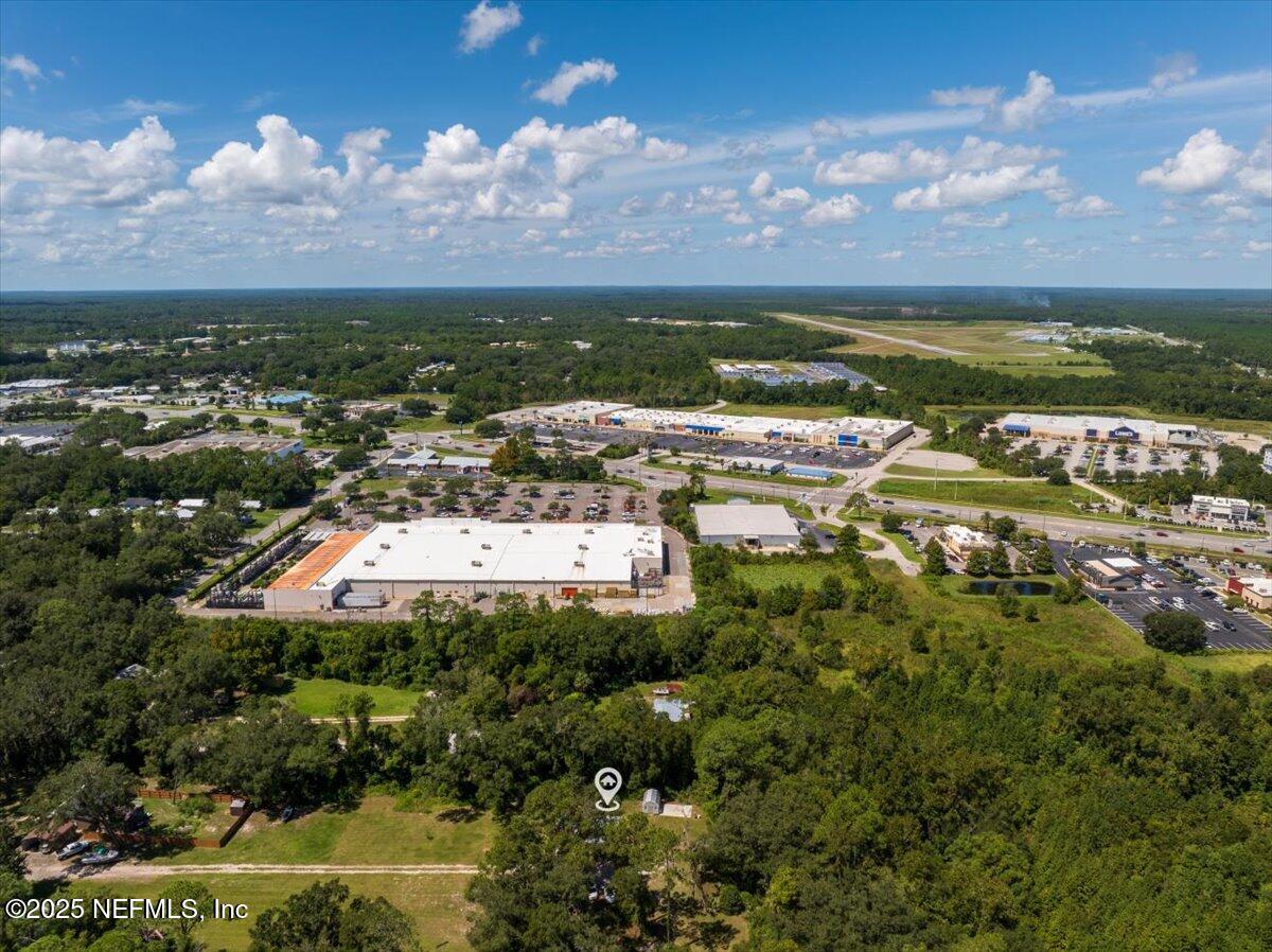 3514 Weaver Road Palatka, FL 32177 - Photo 25 of 30 a view of a lake in front of a building