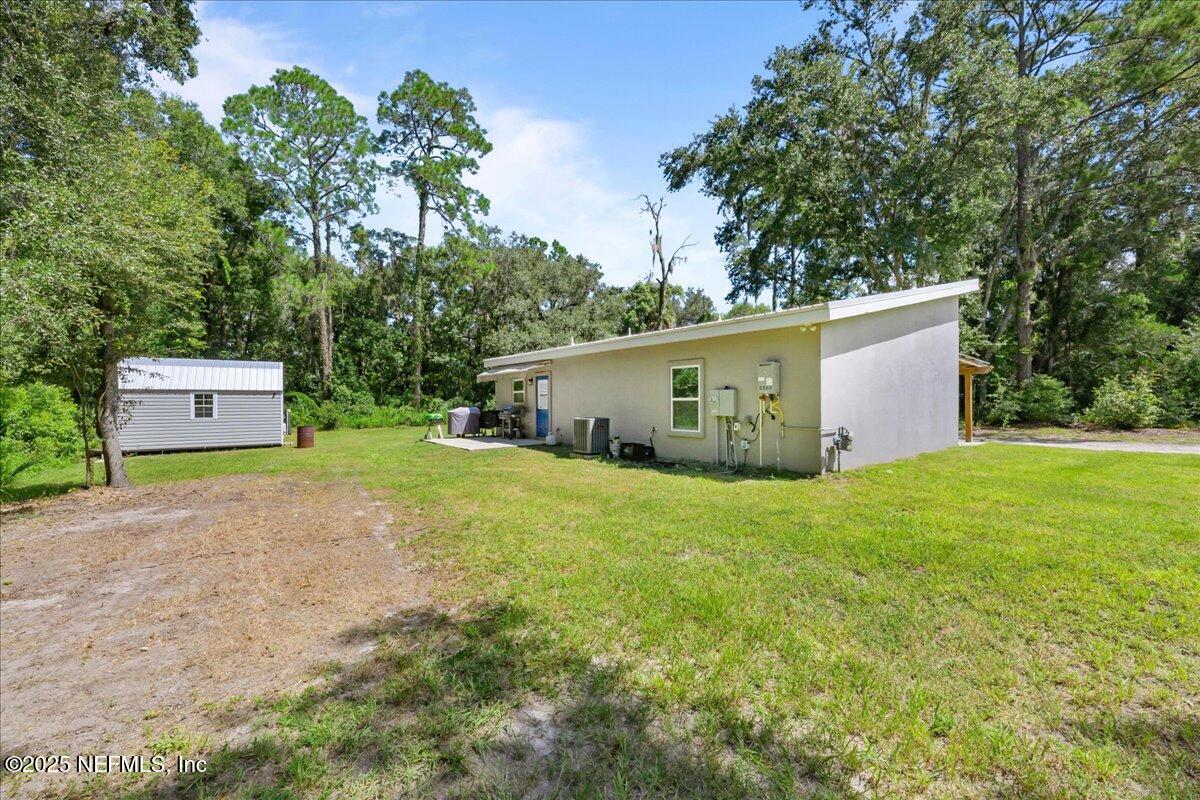 3514 Weaver Road Palatka, FL 32177 - Photo 5 of 30 a house view with a garden space