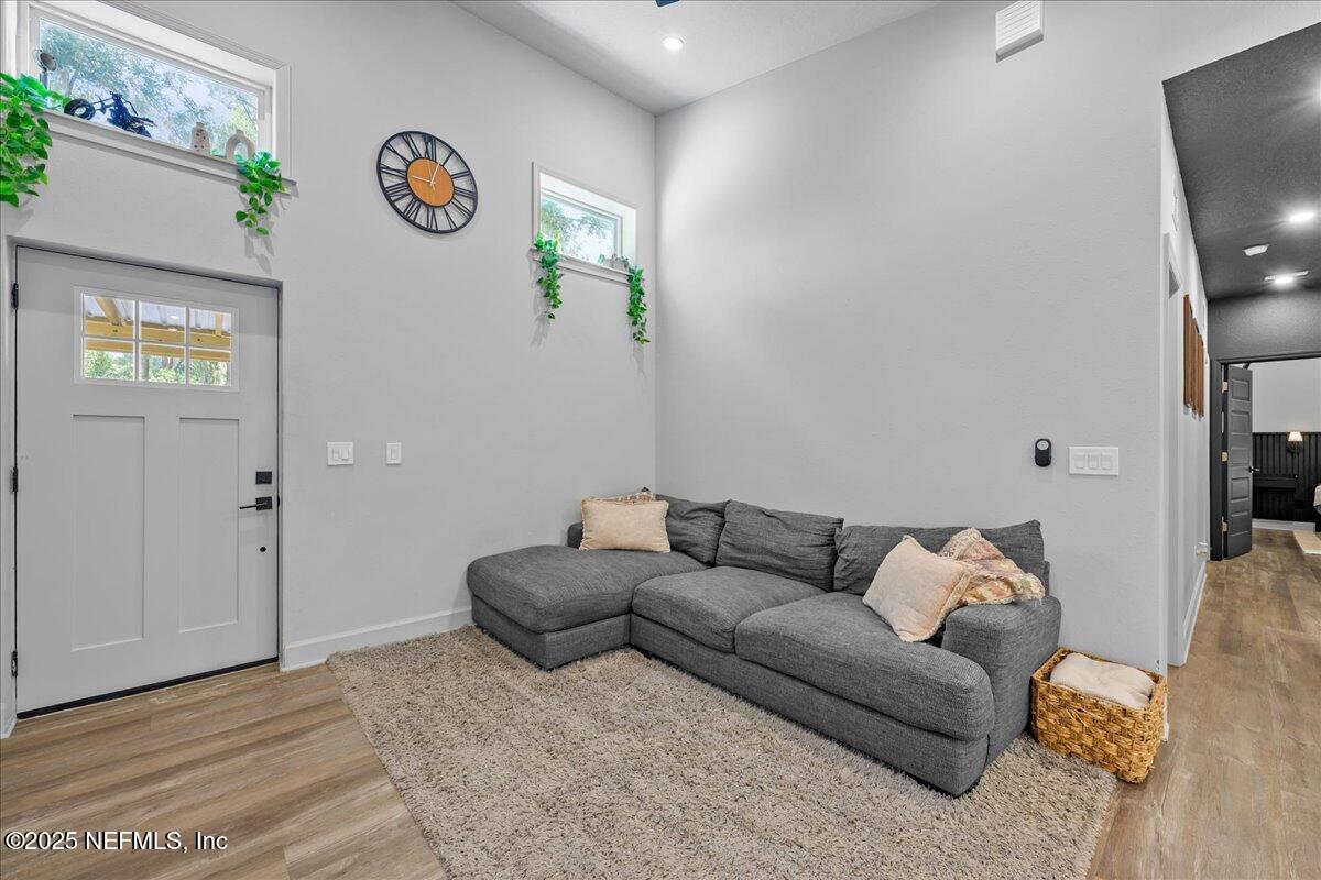 3514 Weaver Road Palatka, FL 32177 - Photo 8 of 30 a living room with furniture and a flat screen tv