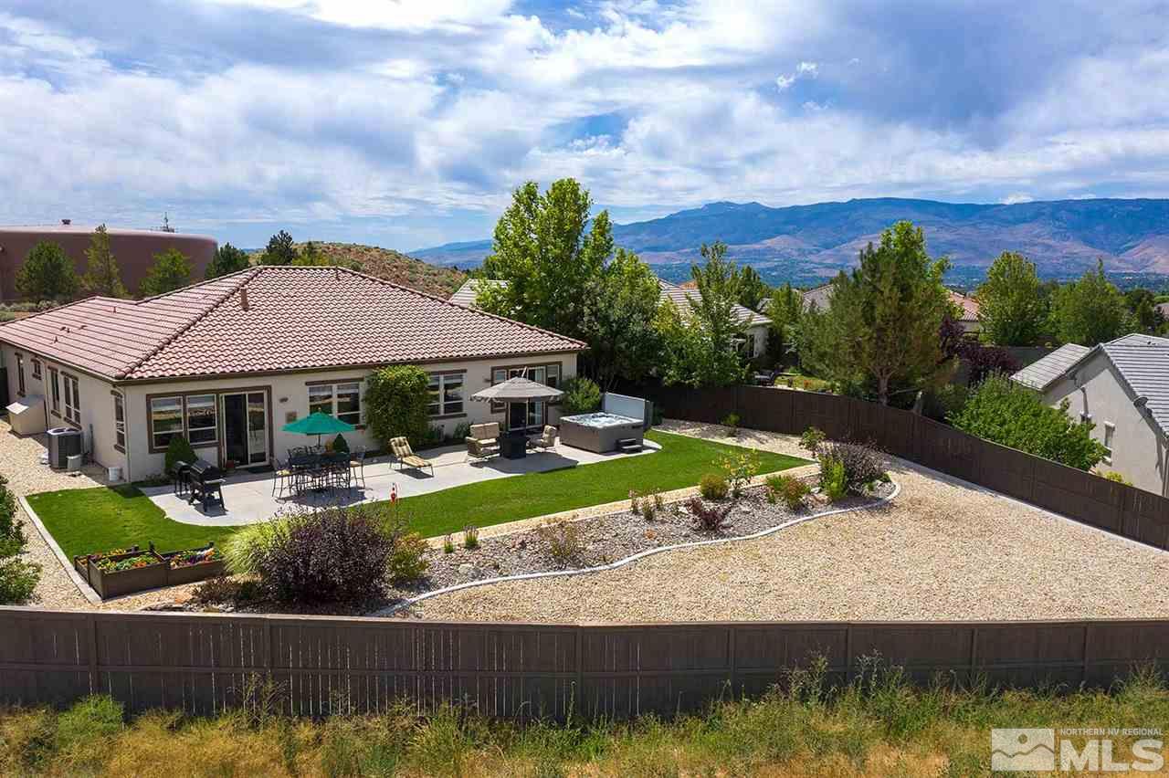 1170 South University Reno, NV 89512 - Photo 2 of 14 a view of a house with swimming pool and a yard